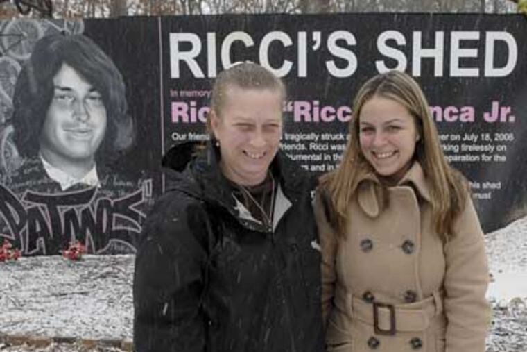 Sherri Branca, left, who lost her son Ricci when he was killed by a drunk driver three years ago, stands with daughter Adriene outside a memorial shed where BMX riders can get spare parts. Ricci was an avid biker. (April Saul / Staff Photographer)