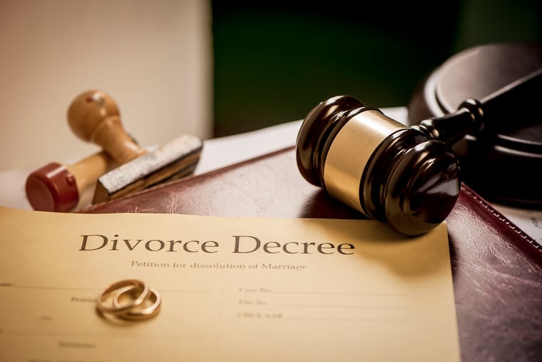 Divorce decree and wooden gavel
