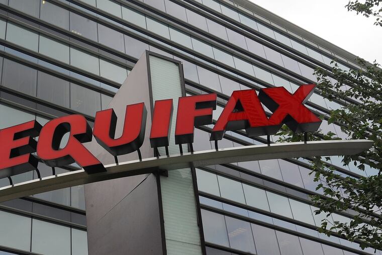 This July 21, 2012, file photo shows signage at the corporate headquarters of Equifax Inc. in Atlanta. Credit bureau Equifax announced, Friday, Aug. 5, 2022, that a computer coding error resulted in the miscalculation of credit scores for consumers in a three-week period between March 17 and April 6, 2022. For 300,000 consumers, the error shifted credit scores as much as 25 points. The changes to credit scores did not show up on credit reports.