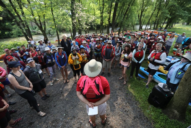 Matt Stan leads a safety briefing at the start of the Schuylkilll Sojourn a 115 mile trip from Schuylkill Haven to Philadelphia starting June 1, 2019