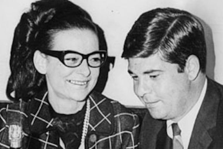 Simone shares some champagne with client Lillian Reis.