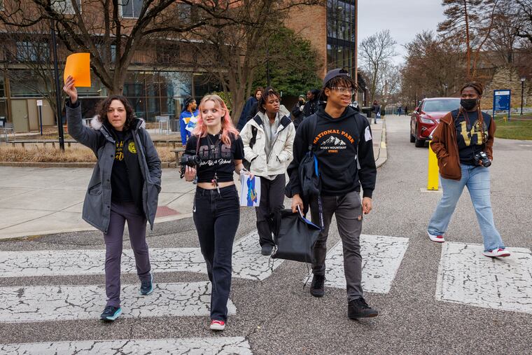 At left is Kalia DeFrancesco, teacher of Health and Physical Education at Philadelphia High School for Girls leads Group 2 to their breakout session on the campus of La Salle University. Philadelphia High School for Girls, organized S.A.F.E. Summit at La Salle University on Wednesday, March 15, 2023. Discussions were held on impact of violence on schools and youth.