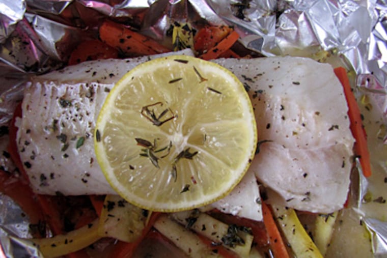 Cod With Lemon, Herbs and Wine is less expensive than using halibut. To cut costs even further, make only two servings. (Maureen Fitzgerald)