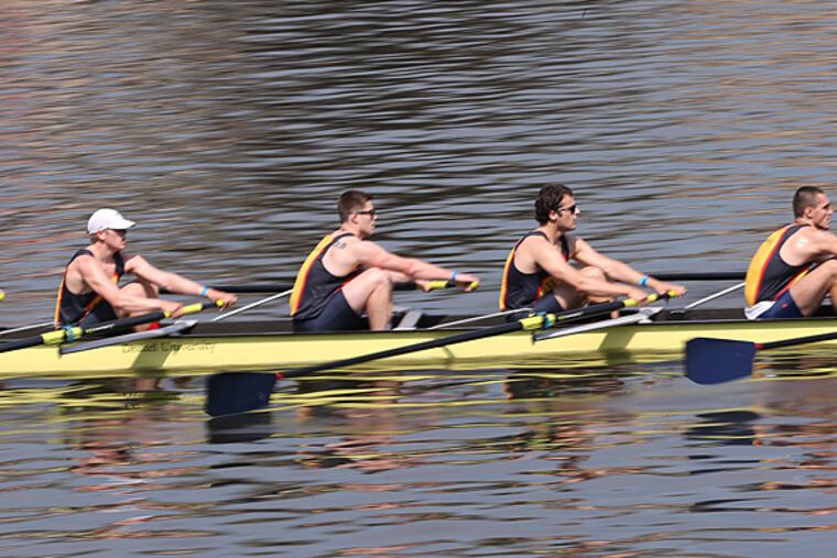 Members of Drexel University's Men's Varsity Heavyweight Eight crosses the finish line during heat at the Aberdeen Dad Vail Regatta in Philadelphia, Pa. on May 8, 2015. (David Maialetti/Staff Photographer)