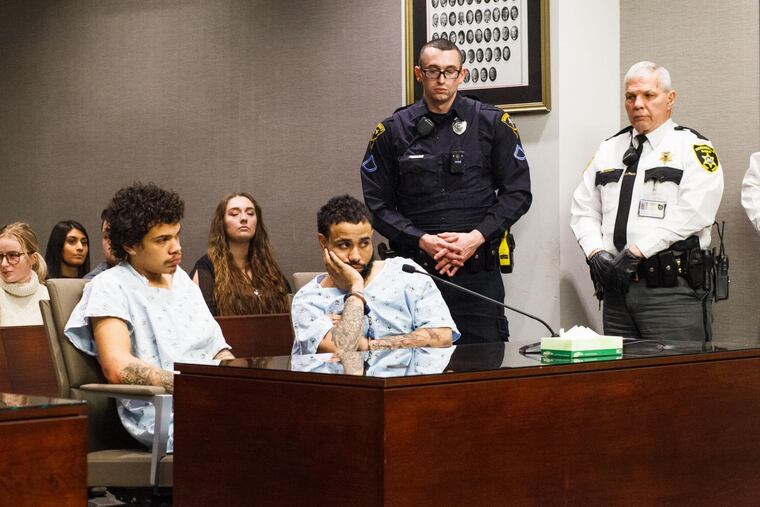 Terrell Linear, left, and Shaundarius T. Reeder, right, are arraigned Friday in Monongalia County Magistrate Court. Both are charged with first-degree murder after the death of a WVU student at the College Park apartment complex.
