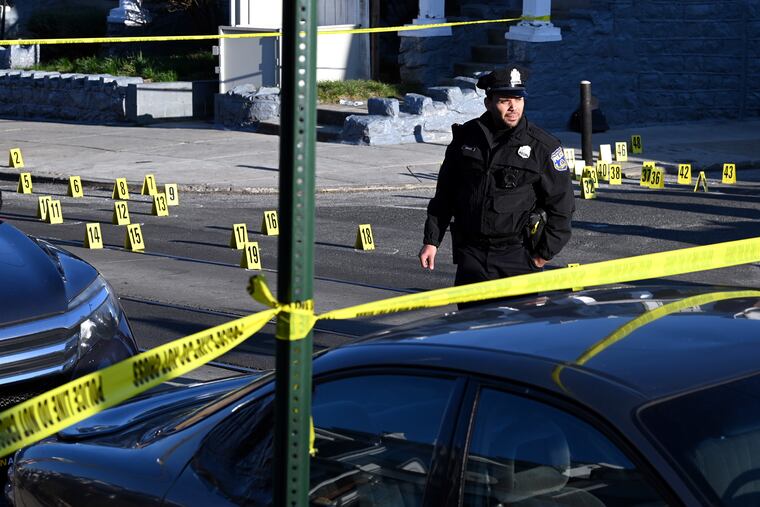 The scene at Lansdowne Avenue and North Frazier Street after gunfire injured three teenage boys.