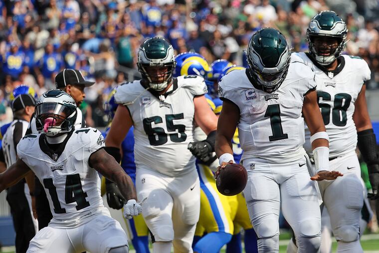 Philadelphia Eagles quarterback Jalen Hurts celebrates after scoring a touchdown late in the first half against the Rams last week. On Sunday, the Birds will head up I-95 to face the Jets at MetLife Stadium.