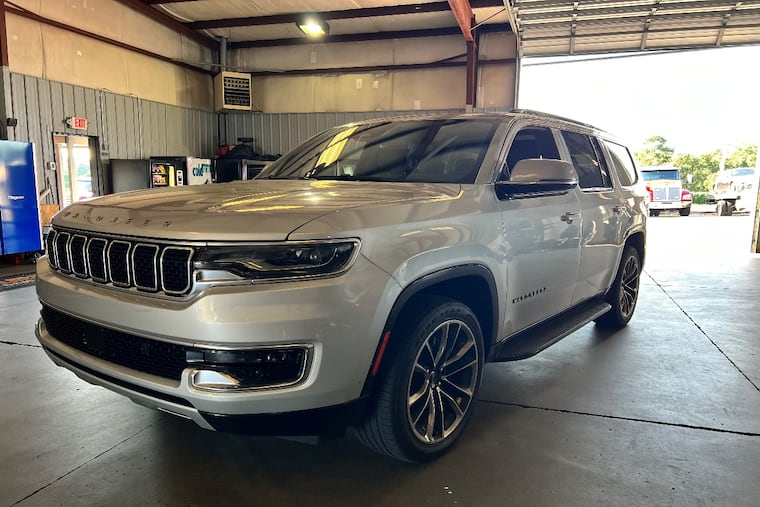 This 2024 Jeep Wagoneer L Series II is one of 65 vehicles that state investigators say was "title washed" by Adam Richardson. Richardson used his title agency to help resell luxury cars stolen from New Jersey and Philadelphia.