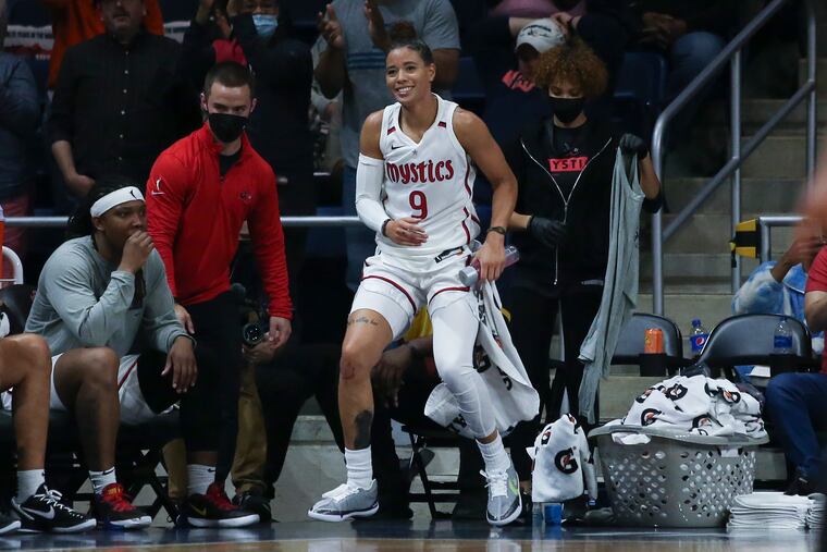 Natasha Cloud (9) is among the faces of the WNBA's Washington Mystics. But the Cardinal O'Hara and St. Joe's alumna also is at the forefront of the league's social justice activism.