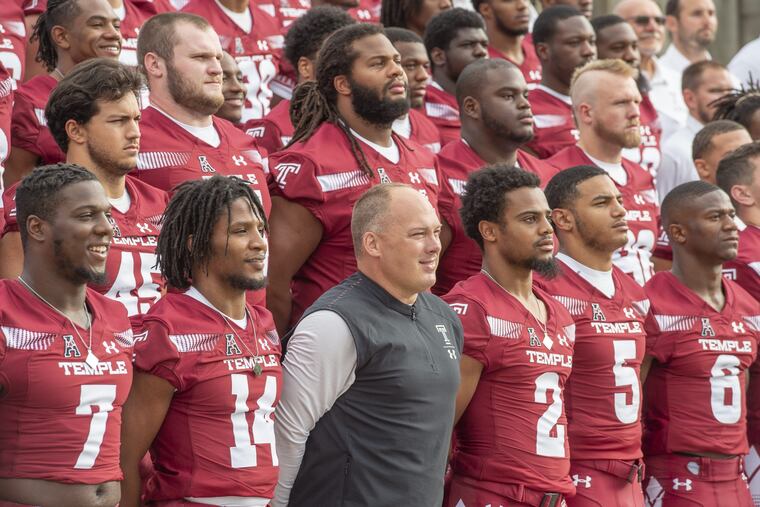 OWLSFB03-d.Members of the Temple University Football Team pose with Head Coach Geoff Collins, for a team photo on the steps of the Philadelphia Museum of Art on Thursday August 2, 2018. From left are Ryquell Armstead, 7, Brodrick Yancy, 14, Collins, Delvon Randall, 2, Shaun Bradley, 5, and Rock Ya-Sin , 6. (Jonathan Wilson / For the Inquirer)