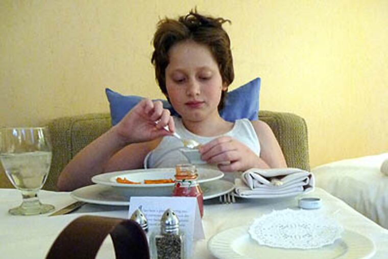 Ben Miller, 12, a patient who stayed under the Ritz-Carlton's medical concierge program last Feburary while he underwent spinal surgery to treat his scoliosis at Shriners Hospital for Children. (Photo by Susan Miller)