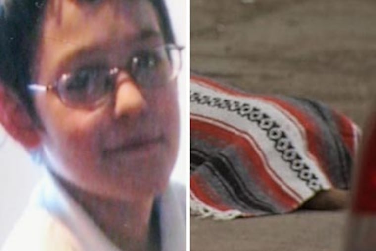 Shane Bucher, 11, was mauled by Zeus, an American bulldog (right, under blanket). A neighbor shot the dog while it was attacking the boy. (DANA DiFILIPPO / Staff)