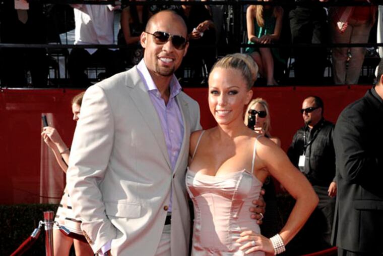 Hank Baskett, left, and Kendra Wilkinson arrive at the ESPY awards on Wednesday, July 13, 2011, in Los Angeles. (AP Photo/Dan Steinberg)