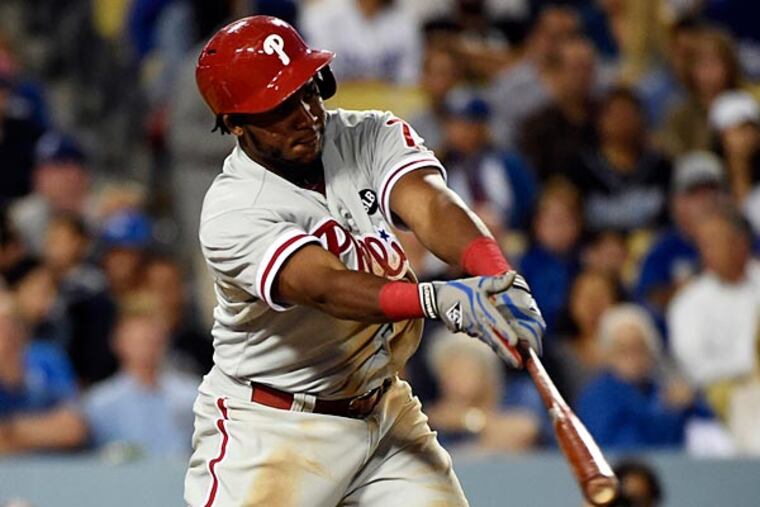 Philadelphia Phillies third baseman Maikel Franco (7) singles against the Los Angeles Dodgers during the fifth inning at Dodger Stadium. (Richard Mackson/USA Today)