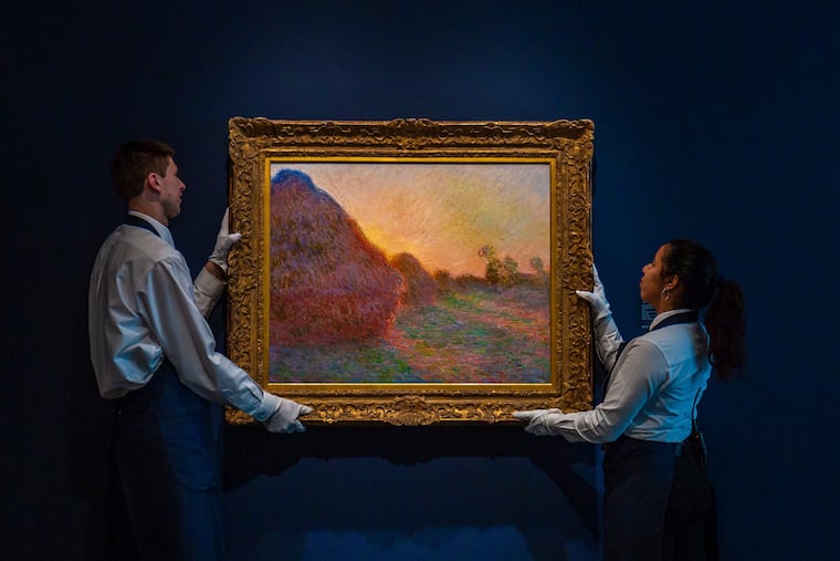This undated photo provided by Sotheby's shows Claude Monet's painting titled "Meules." The painting, one of Monet's iconic renderings of haystacks, has fetched a record $110.7 million at an auction in New York. The 1890 painting sold at Sotheby's sale of Impressionist & Modern Art Tuesday night, May 14, 2019. (Courtesy Sotheby's via AP)