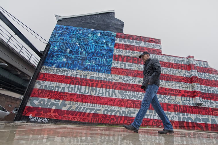Todd Carmichael, founder of La Colombe, walks near the Fistown area in Philadelphia, Pa.