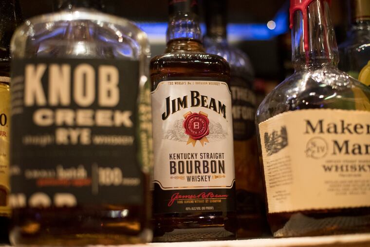 Jim Beam, Knob Creek and other alcohol bottles are pictured at a bar in Eagle, Colo., in 2018.