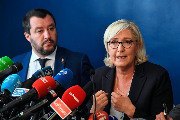 Far-right leader Marine Le Pen, right, talks flanked by Italian Interior Minister and Deputy Premier, Matteo Salvini, during the meeting "economic growth and social prospects in a Europe of nations", in Rome, Monday, Oct. 8, 2018.