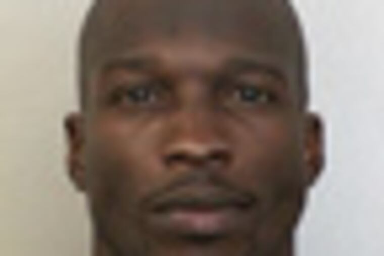 This undated photo provided by the Broward Sheriff's Office shows Miami Dolphins wide receiver Chad Johnson. A judge has set bond at $2,500 for Johnson, who is being held in a Florida jail on a domestic violence charge after his wife accused him of head-butting her during an argument. Johnson's defense attorney, Adam Swickle, says Johnson posted the bond early Sunday, Aug. 12, 2012, though jail records show he had not yet been released. Swickle says a no-contact order has been issued that prevents Johnson from contacting his wife, Evelyn Lozada. (AP Photo/Broward Sheriff's Office)