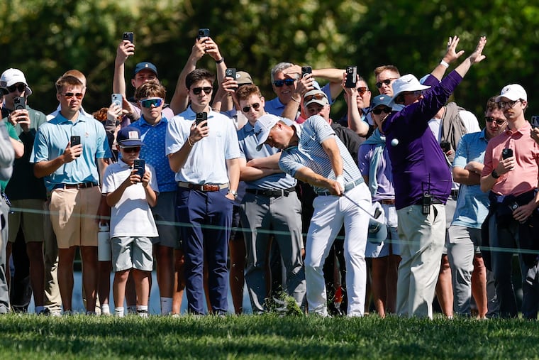 Justin Thomas hits an approach shot on the seventh hole during the third round of the Truist Championship golf tournament at the Philadelphia Cricket Club on May 10.