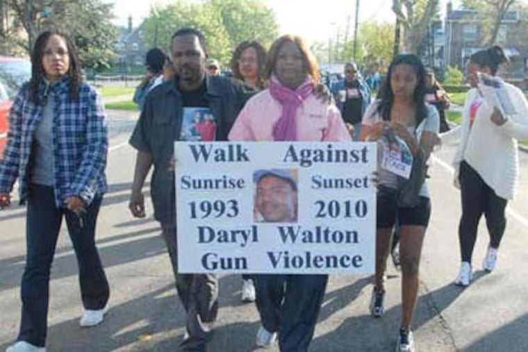 Many participants were on teams organized in memory of victims of gun violence, including the family of Daryl Walton, who was killed in Philadelphia in March. (Bob Williams / For the Inquirer)