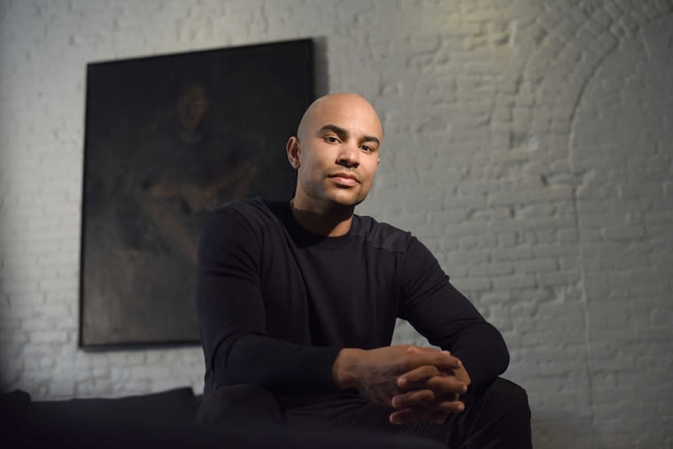 MANHATTAN, NEW YORK, MARCH 14, 2018 Philadephia 76ers basketball player Jerryd Bayless is seen in his home in Manhattan, NY. Bayless is an avid reader, art collector and is currently pursuing his undergraduate degree online. The painting behind Bayless is by Lynette Yiadom-Boakye and entitled A Pedigree of Some Note. 3/14/2018