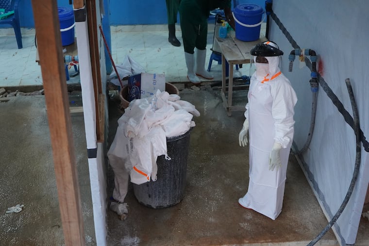 A health worker stands at an ebola treatment centre in Bunia, Congo, Monday, July 20, 2026.