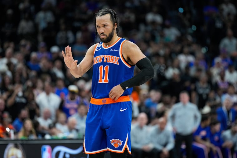 Knicks guard Jalen Brunson motions to teammates during the second half of Game 5 of the NBA Finals basketball series against the San Antonio Spurs.