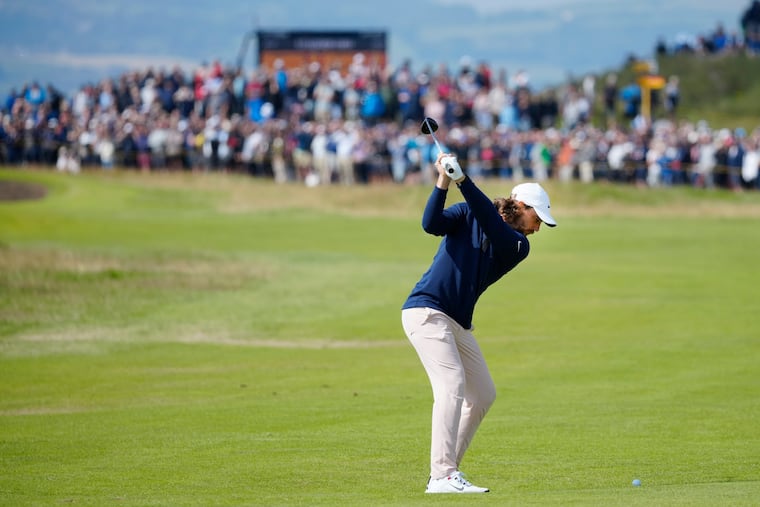 England's Tommy Fleetwood plays a shot from the 5th fairway on the first day of the British Open Golf Championships at the Royal Liverpool Golf Club in Hoylake, England, Thursday, July 20, 2023. (AP Photo/Jon Super)