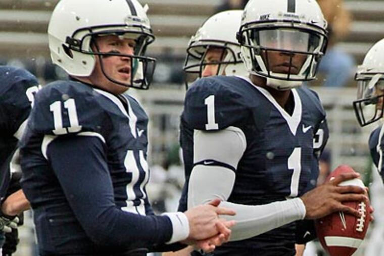 Matt McGloin (left) is expected to start for Penn State in the Outback Bowl. (Gene J. Puskar/AP file photo)