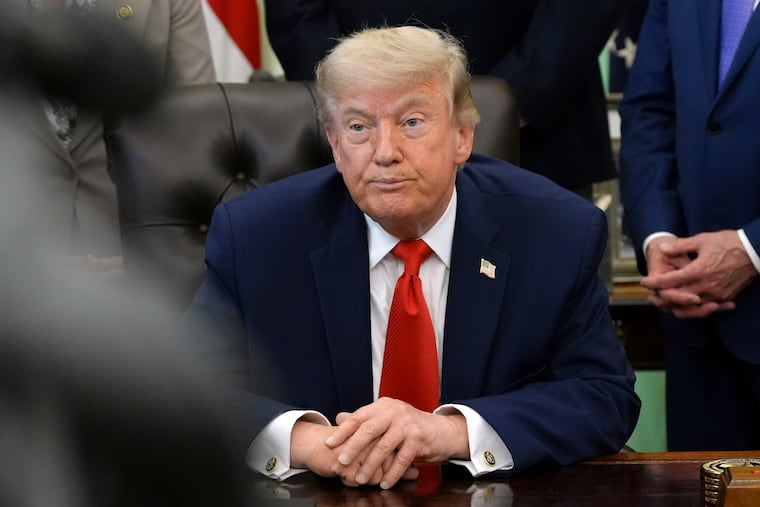 President Donald Trump listens during an event in the Oval Office of the White House, Thursday, June 11, 2026, in Washington.
