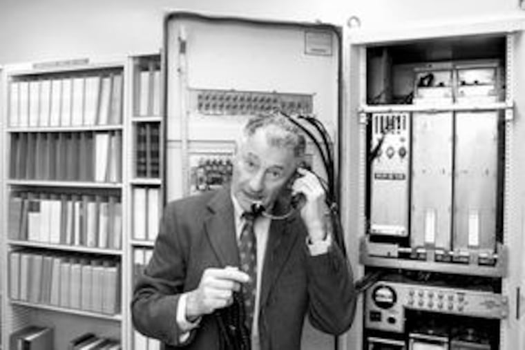Leonard Kleinrock demonstrates how the first Internet communication was made back in 1969 with the help of an Interface Message Processor machine at his office at the UCLA Computer Science Department in Los Angeles.