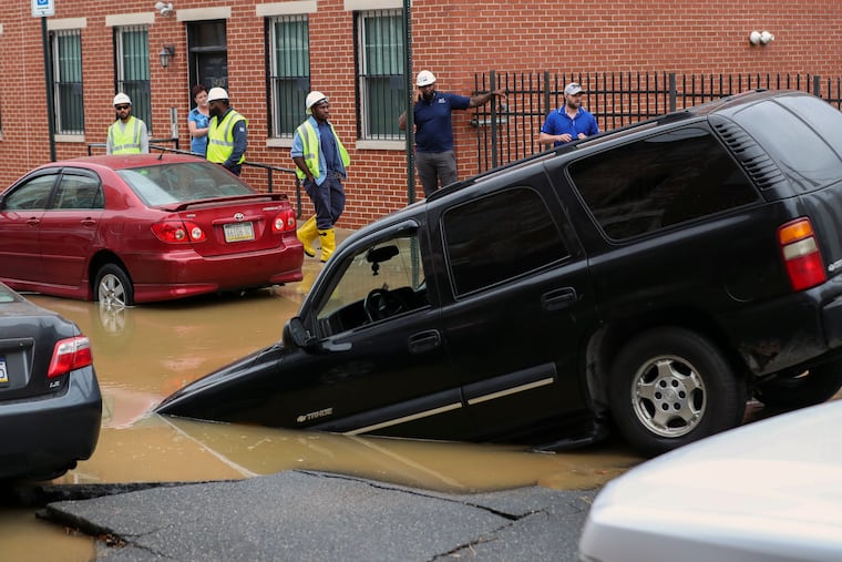 A water main break at Hewson Street and North Fourth Street in Philadelphia on Thursday caused the road to buckle and flooded the street for hours.