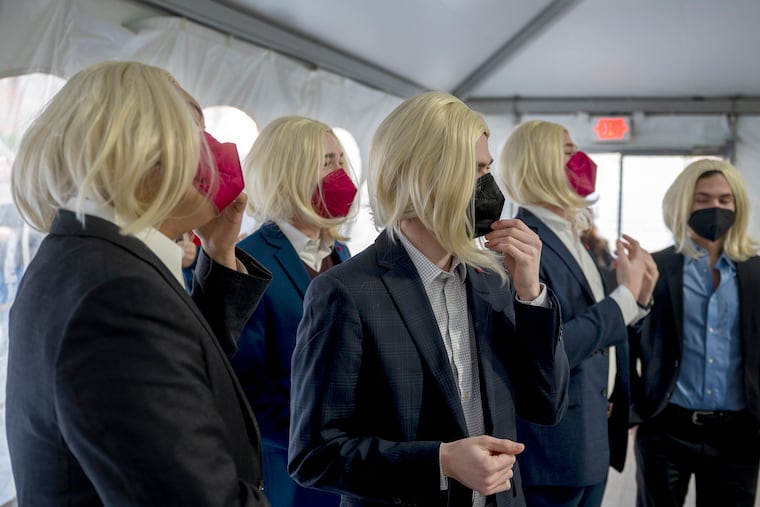 February 14, 2022: Members of the University of Pennsylvania Mask and Wig Club and the Bloomers musical comedy troupes wait to perform - wearing Gutmann wigs - during a goodbye event for Penn president Amy Gutmann, who will soon leave for Berlin to serve as the U.S. ambassador to Germany.