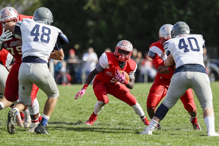 St. Joseph's Jada Byers runs last year vs. rival St. Augustine.