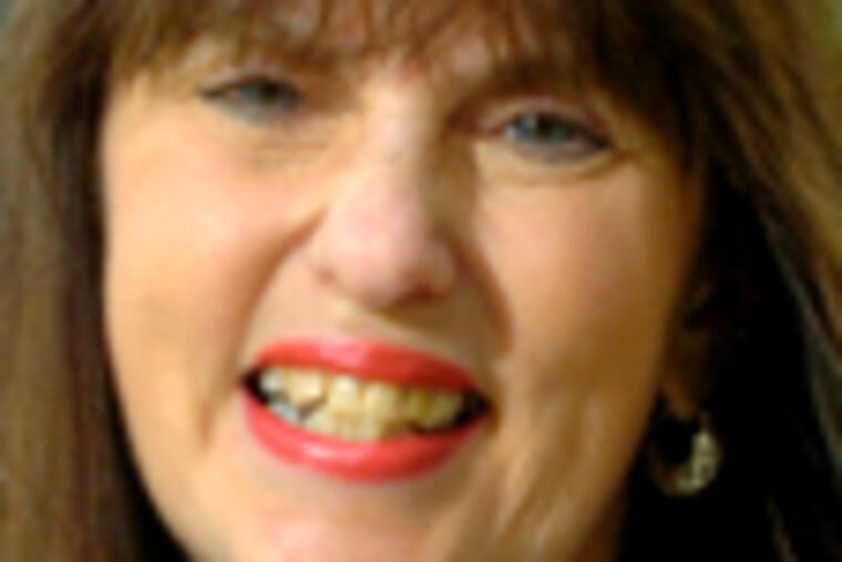 Wendy Heacock, 57, of Oley, Pa., one of the cancer survivors in the mural ...