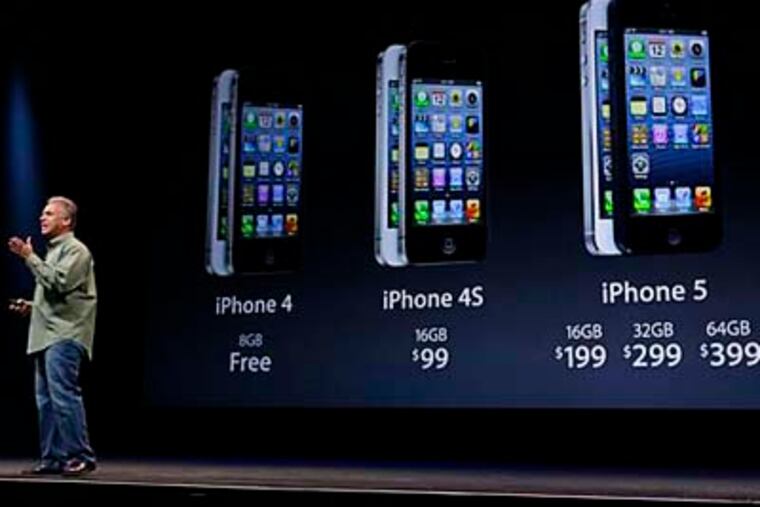 Phil Schiller, Apple's senior vice president of worldwide marketing, speaks on stage during an introduction of the new iPhone 5 in San Francisco, Wednesday Sept. 12, 2012. (AP Photo/Eric Risberg)
