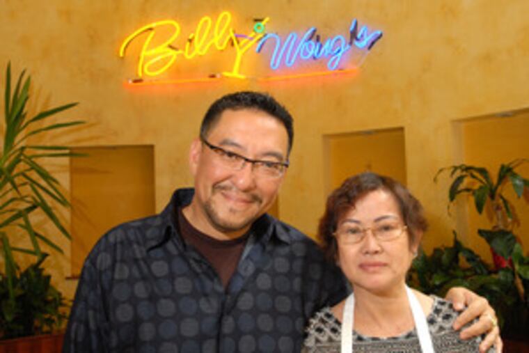 New partner Billy Wong and new chef Dung K. "Kim" Dang, who will be cooking the food of her native Vietnam at Ly Michael's.