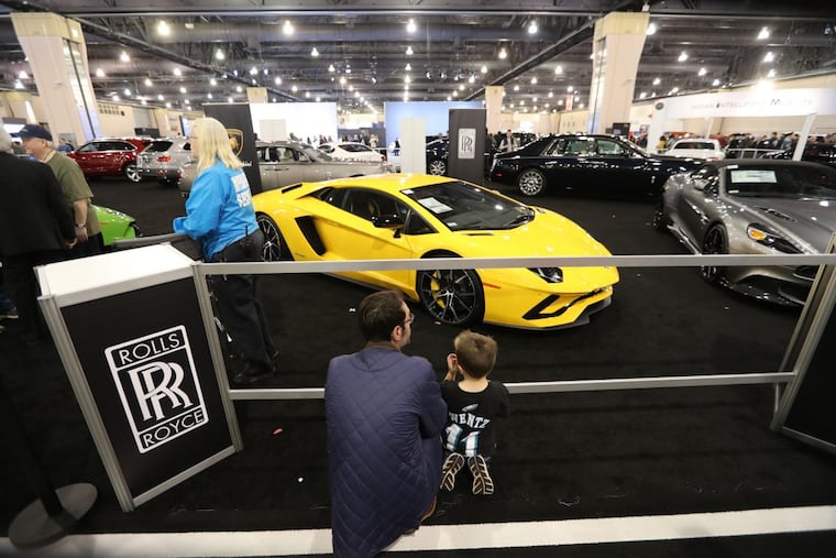 Attendees at the car show at the Pennsylvania Convention Center