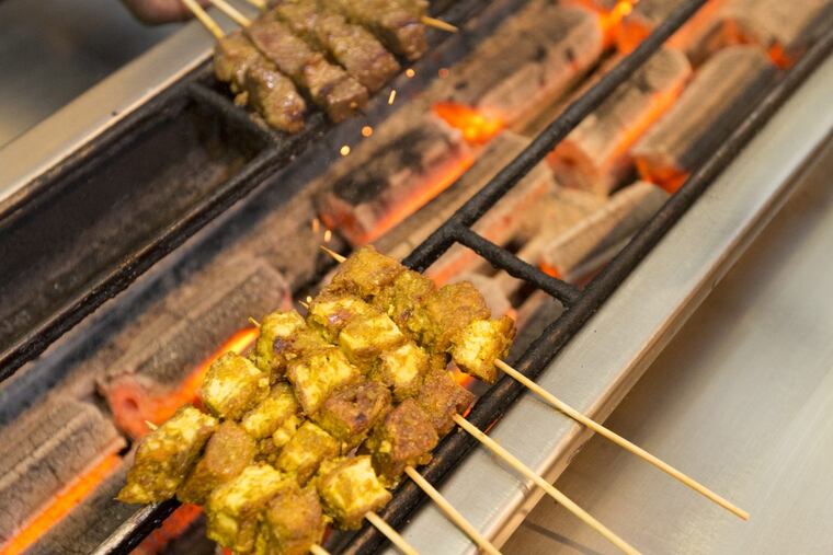 The charcoal-grilled Malaysian skewers at Saté Kampar on East Passyunk are a great option for Valentine’s Day.