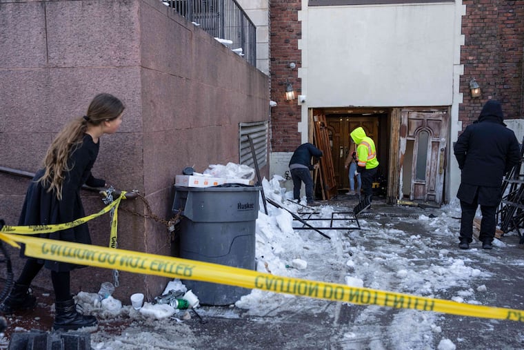 The scene where a car slammed into the entrance of the Chabad Lubavitch world headquarters in New York.