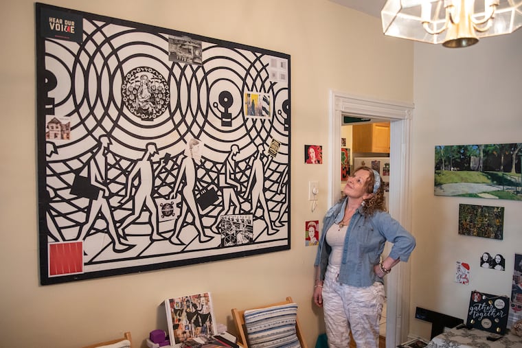 Mary Rastatter, who lives in Philadelphia's Point Breeze neighborhood, has decorated her home with works from local artists, including "Transition 3" by Joe Boruchow. “I’ve always liked modern art," she says.