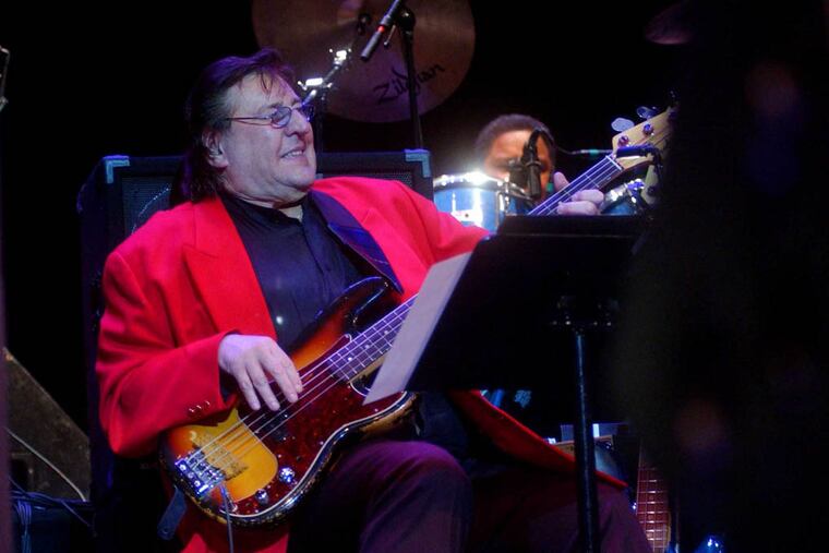 In this April 16, 2003 photo, Bob Babbitt, of the Funk Brothers, plays bass during the Funk Brothers performance at Ohio Theatre in Cleveland's Playhouse Square district. Motown Museum chief curator Lina Stephens says Babbitt died Monday, July 16, 2012, in Nashville, Tenn. He was 74. (AP Photo/Luke Palmisano)