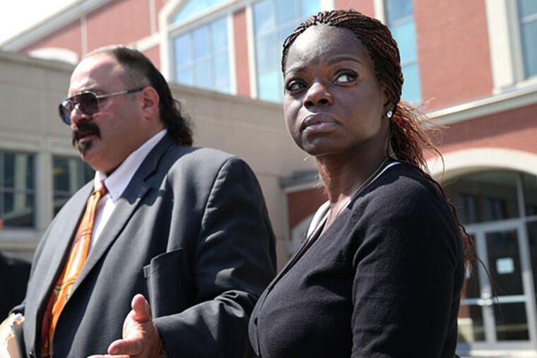 In a Tuesday, Aug. 5, 2014, photo, attorney Evan Nappen and Shaneen Allen, of Philadelphia, Pa., talk to media outside Atlantic County Criminal Court in Mays Landing, N.J. (AP Photo/The Press of Atlantic City, Ben Fogletto)