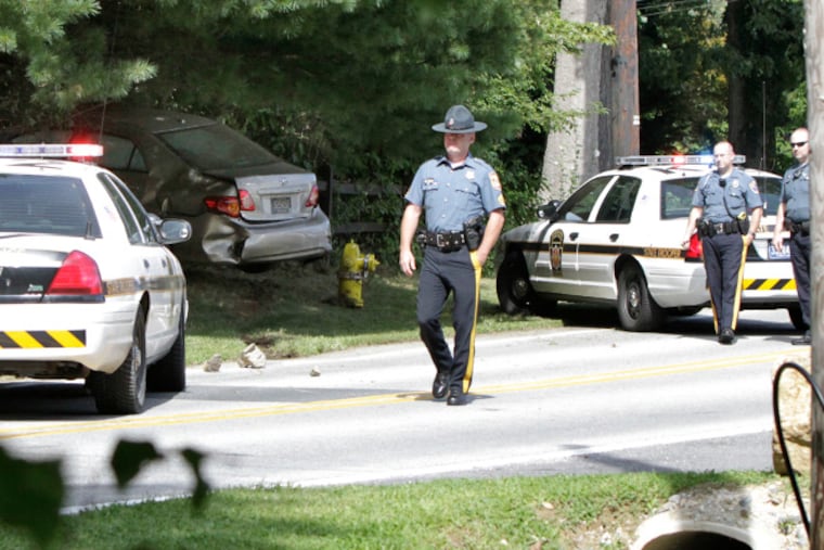 Police investigate the crash scene near 1911 Zebley Rd in Claymont
Delaware on Aug. 25, 2013.The Driver of the Toyota Corolla led PA State, Delaware
State, New Castle County and Upper Chichester Police on a morning
chase through Pa. and Delaware before he was rammed by a police car and crashed. The driver was
taken into custody by New Castle County Police. ( ELIZABETH ROBERTSON / Staff
Photographer )