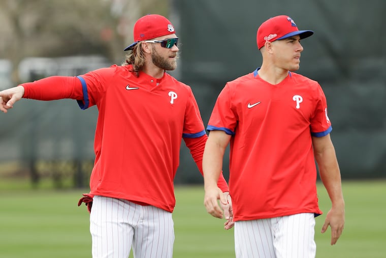 Bryce Harper and J.T. Realmuto (right) were two of the Phillies' biggest acquisitions last offseason, and they have since become good friends.