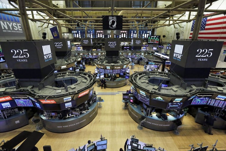 Traders work on the floor of the New York Stock Exchange on Oct. 18, 2017 — almost 30 years to the day after the Oct. 19, 1997, crash known as “Black Monday.”