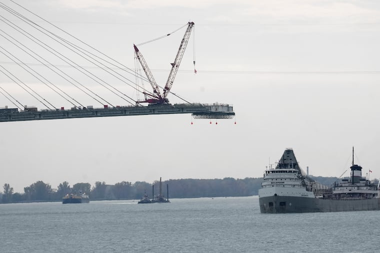 The Saginaw passes construction on the Gordie Howe International Bridge connecting on the Detroit River connecting Windsor, Ontario and Detroit, Oct. 25, 2023.