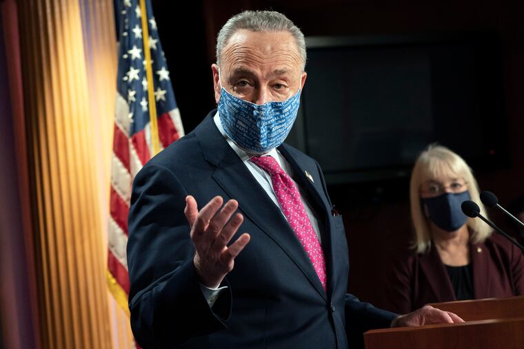 Senate Majority Leader Chuck Schumer of N.Y., left, speaks during a news conference next to Sen. Patty Murray, D-Wash., on Tuesday on Capitol Hill in Washington.
