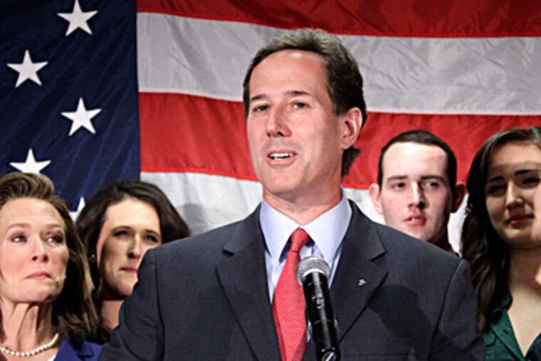 Joined by family members, former U.S. Sen. Rick Santorum announces in Gettysburg that he will suspend his campaign for the GOP presidential nomination. Still, he said, "we are not done fighting." GENE J. PUSKAR / Associated Press